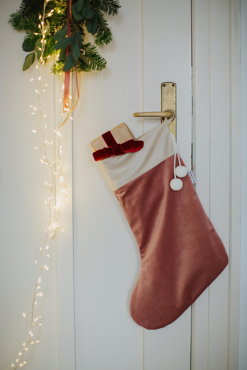 Elegant Velvet Stocking with Festive String Lights — Christmas Stockings Display