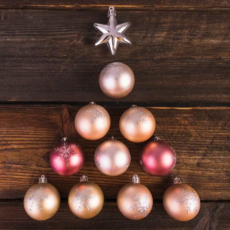 Minimalist Christmas Tree Shape from Pink and Gold Ornaments — Pink and Gold Christmas Tree
