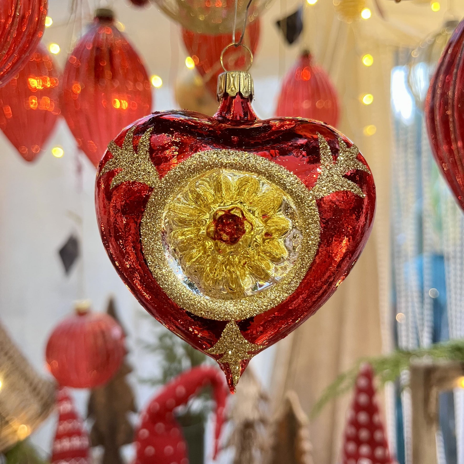 Red Heart-Shaped Glass Ornament with Gold Glitter Accents Red Heart-Shaped Glass Ornament with Gold Glitter Accents — Red and Gold Christmas Tree