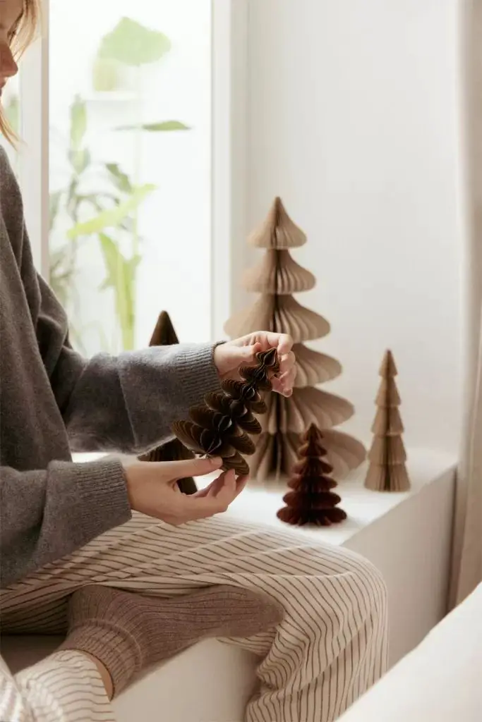 Minimalist Paper Christmas Trees on a Windowsill Minimalist Paper Christmas Trees on a Windowsill — Scandinavian Christmas Tree