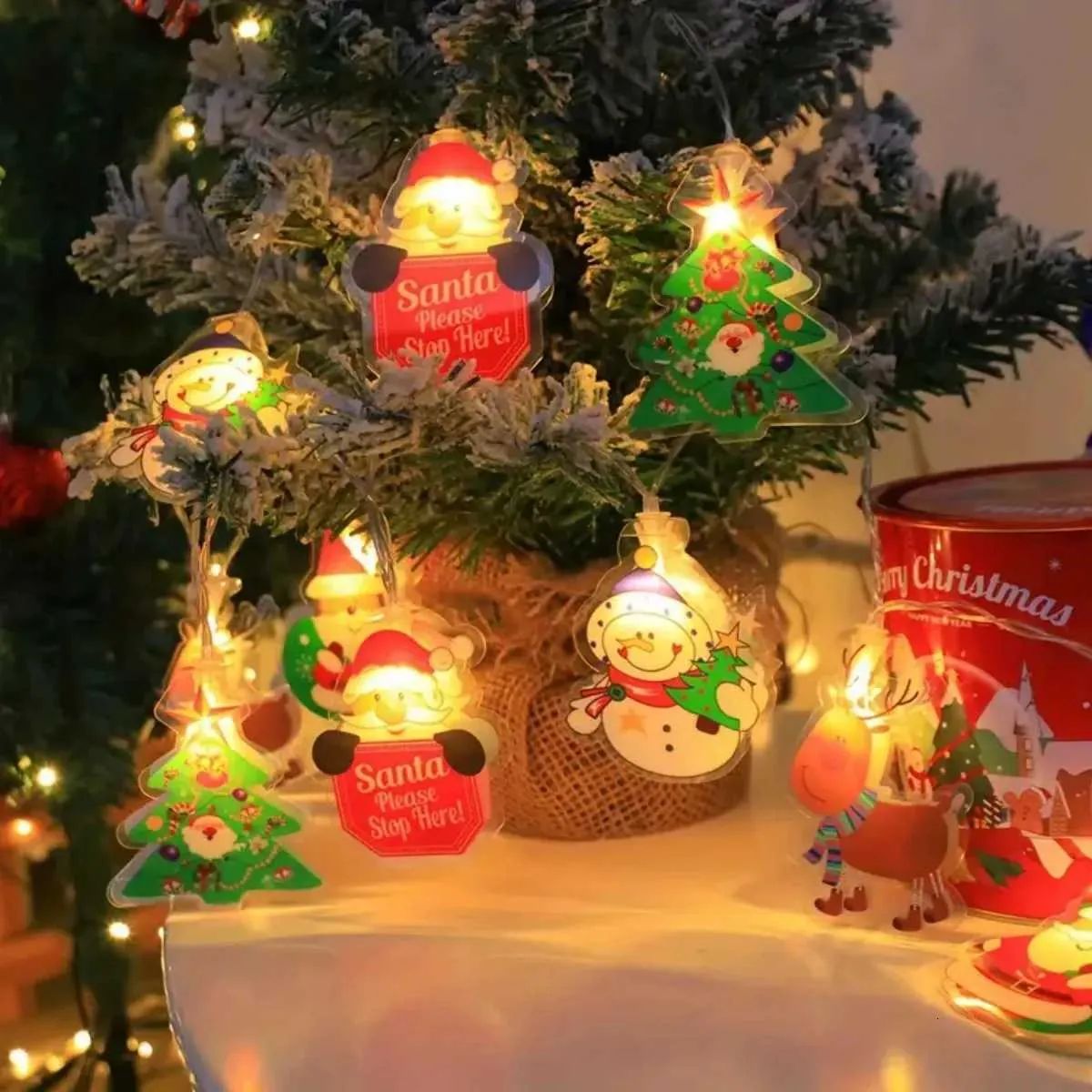 Fairy Lights with Festive Character Ornaments — Christmas Fairy Lights Window