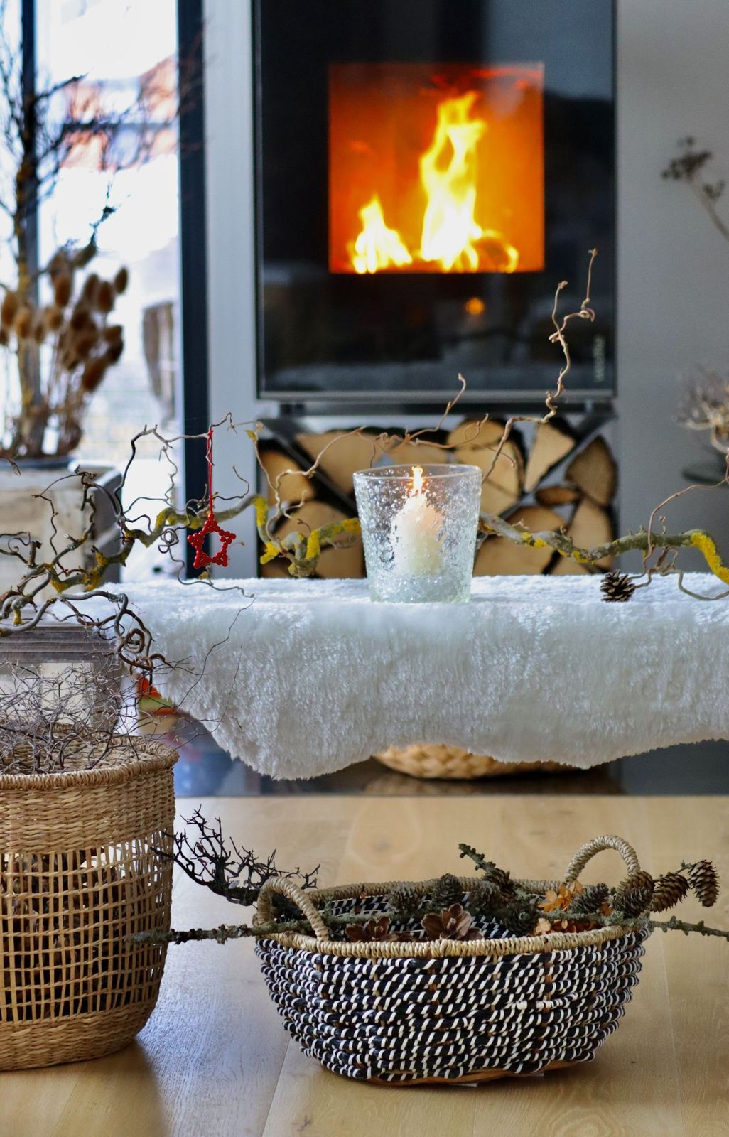 Cozy Fireplace Interior with Logs Wrapped in String Lights — Winter Mantel Decor