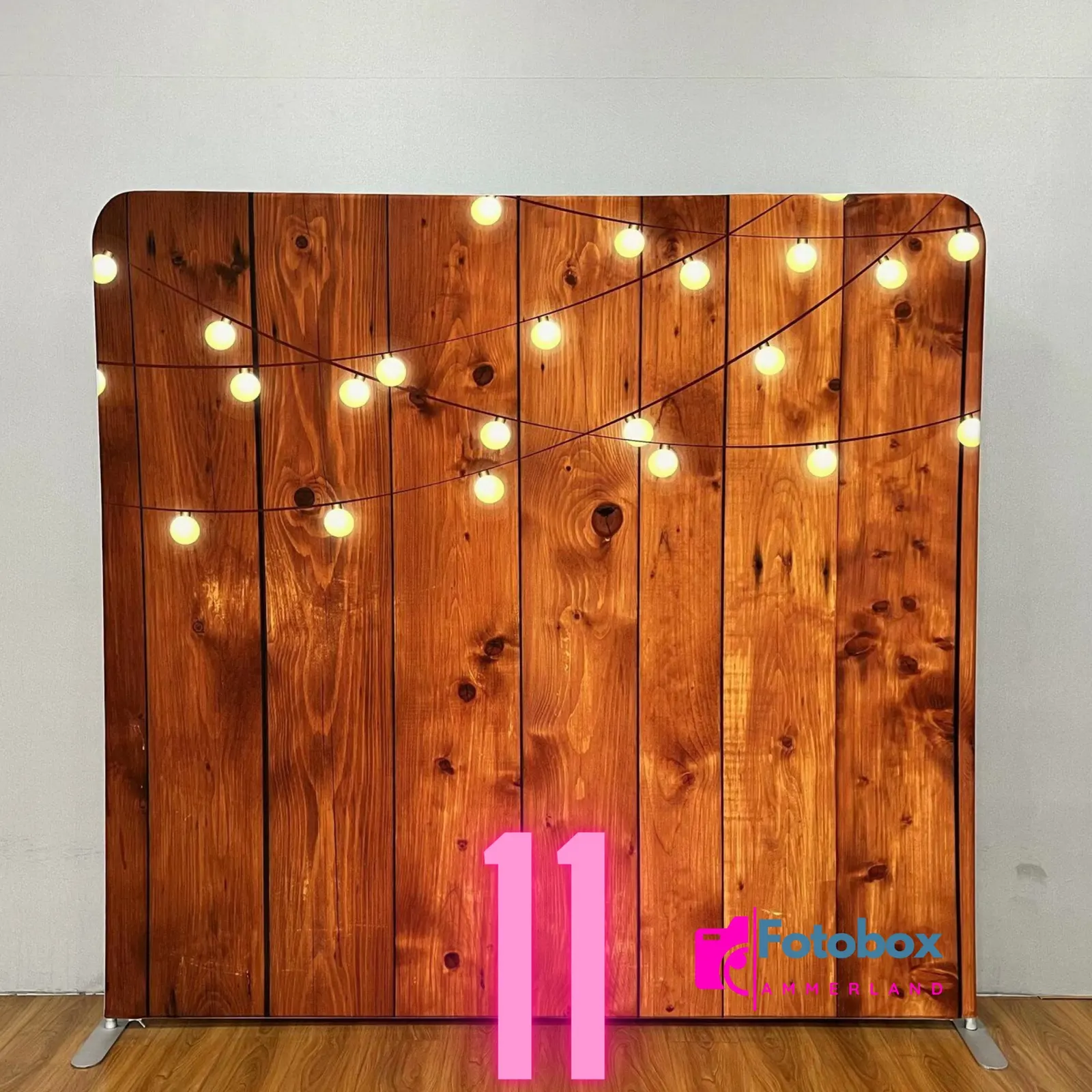 Rustic Wood Grain Backdrop with Warm String Lights — Christmas Party Backdrop