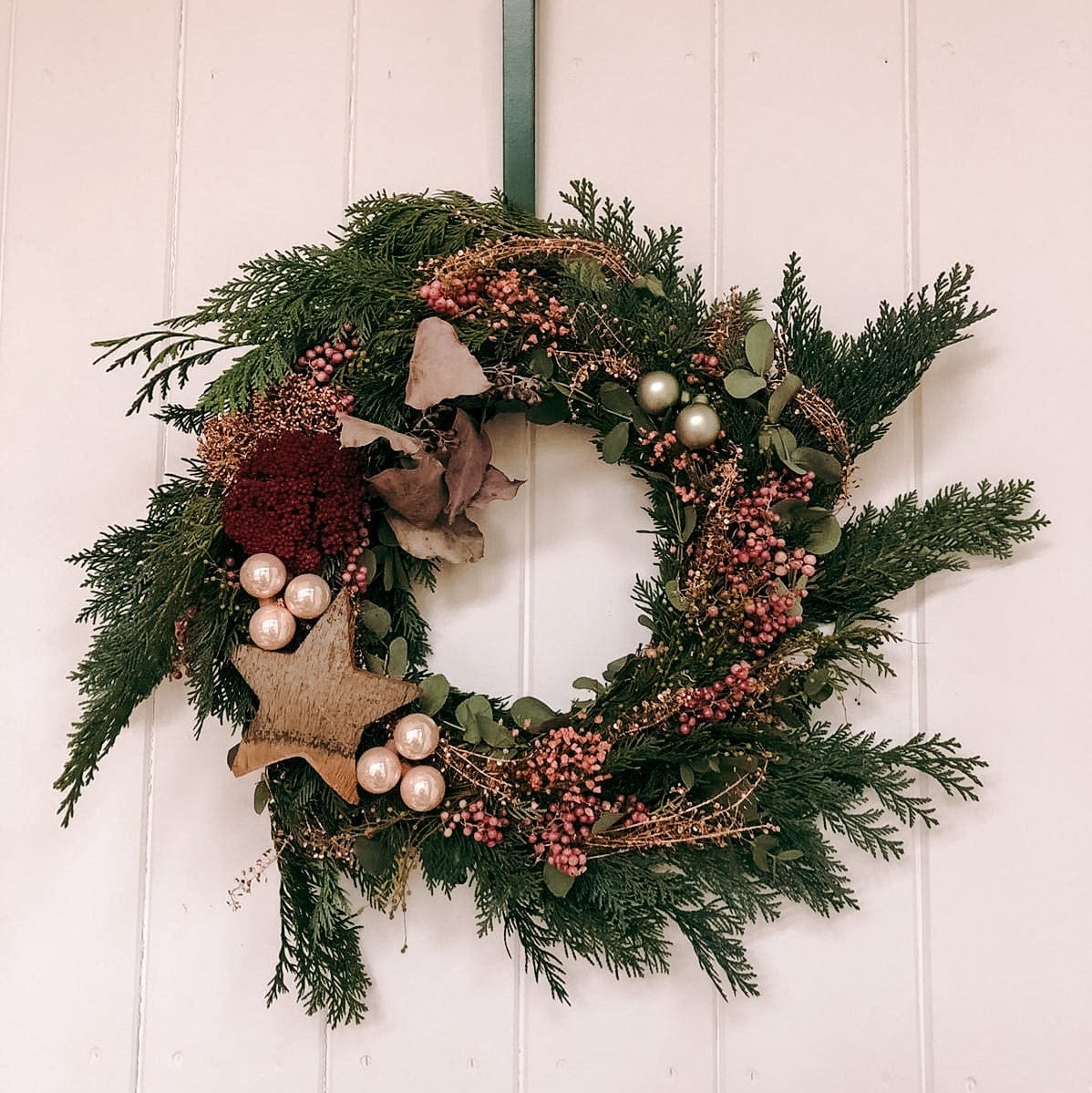 Rustic Greenery Wreath with Pink Berries and Wooden Star Rustic Greenery Wreath with Pink Berries and Wooden Star — Christmas Window Wreaths