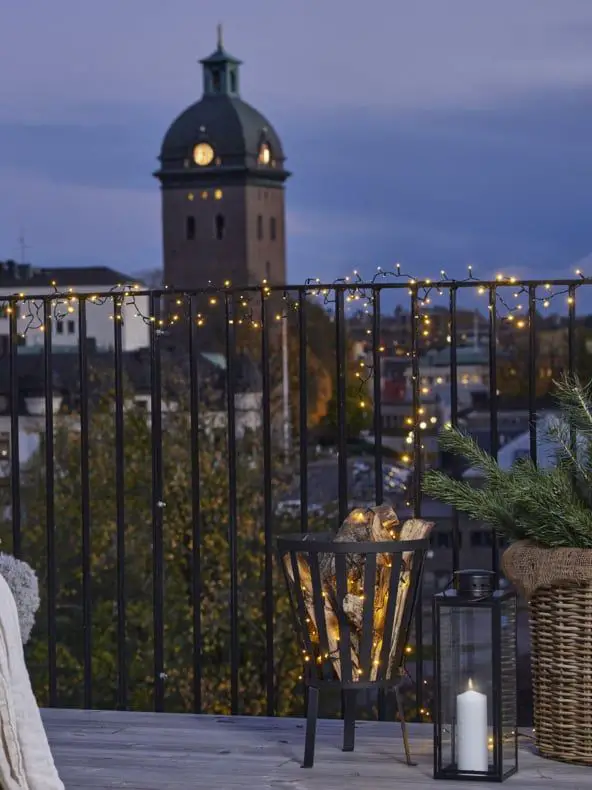 Balcony Ambiance with Draped String Lights Balcony Ambiance with Draped String Lights — Christmas Light Display Ideas
