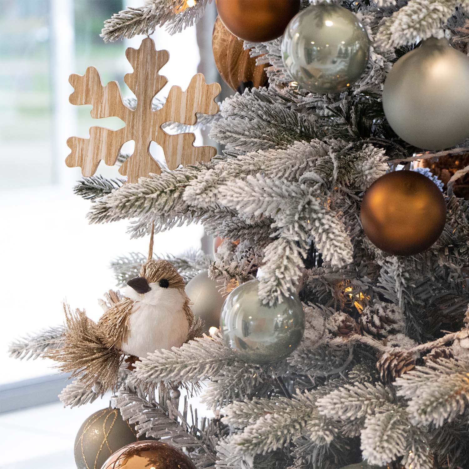 Wintery Flocked Tree with Metallic and Nature-Inspired Ornaments — Ornament Christmas Tree