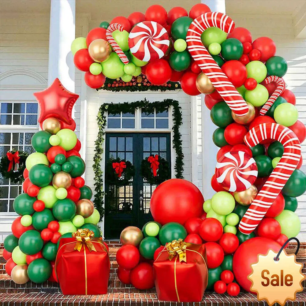 Festive Balloon Garland Arch with Candy Cane Designs and Seated Santa — Christmas Balloon Garland