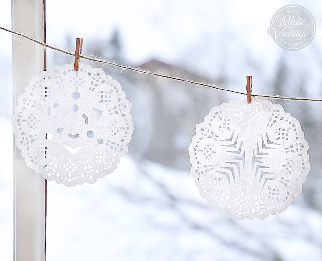 Vintage Paper Doily Snowflakes by a Window — Paper Snowflakes