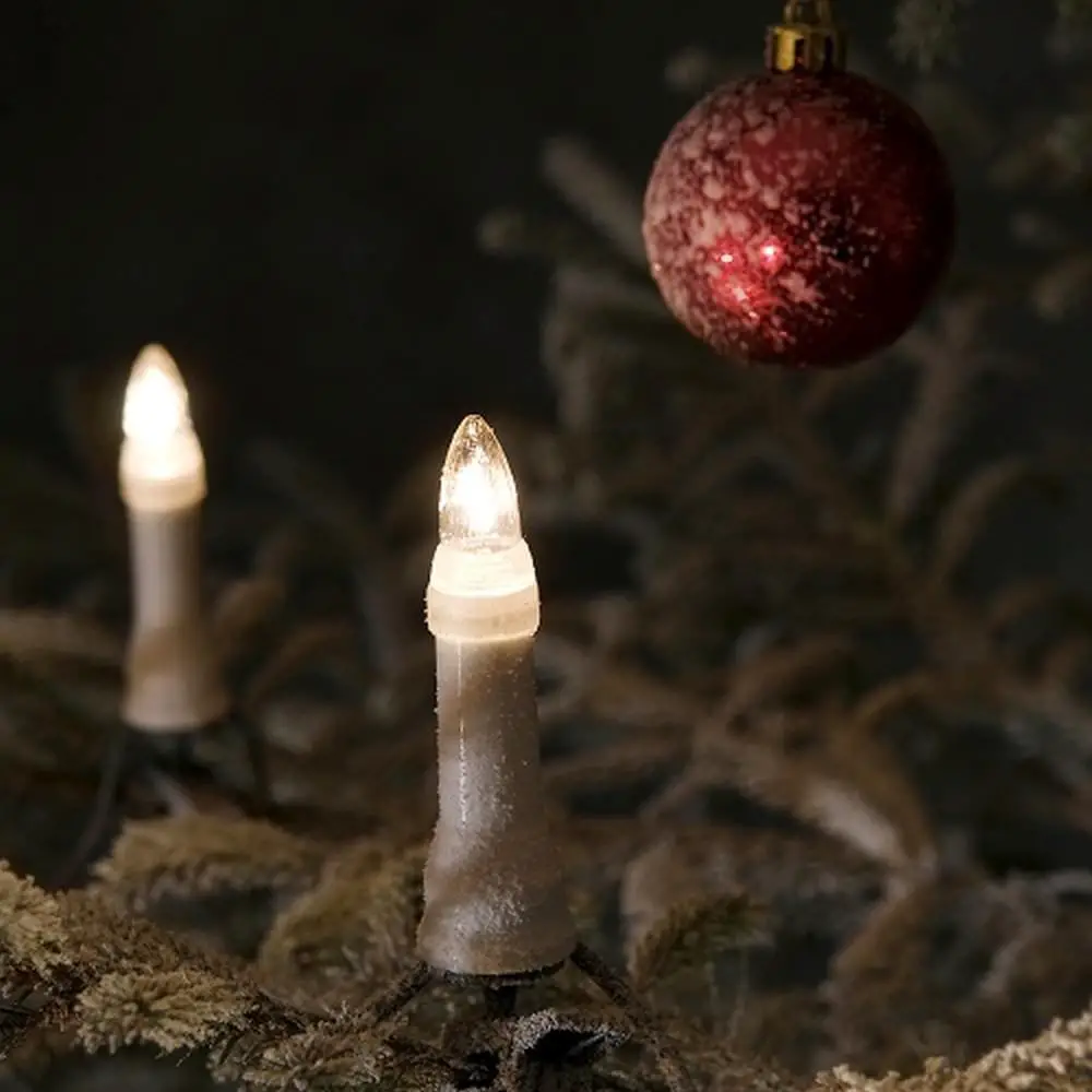 Frosted Christmas Tree with Candle Lights and Red Bauble Frosted Christmas Tree with Candle Lights and Red Bauble — Christmas Tree Lights
