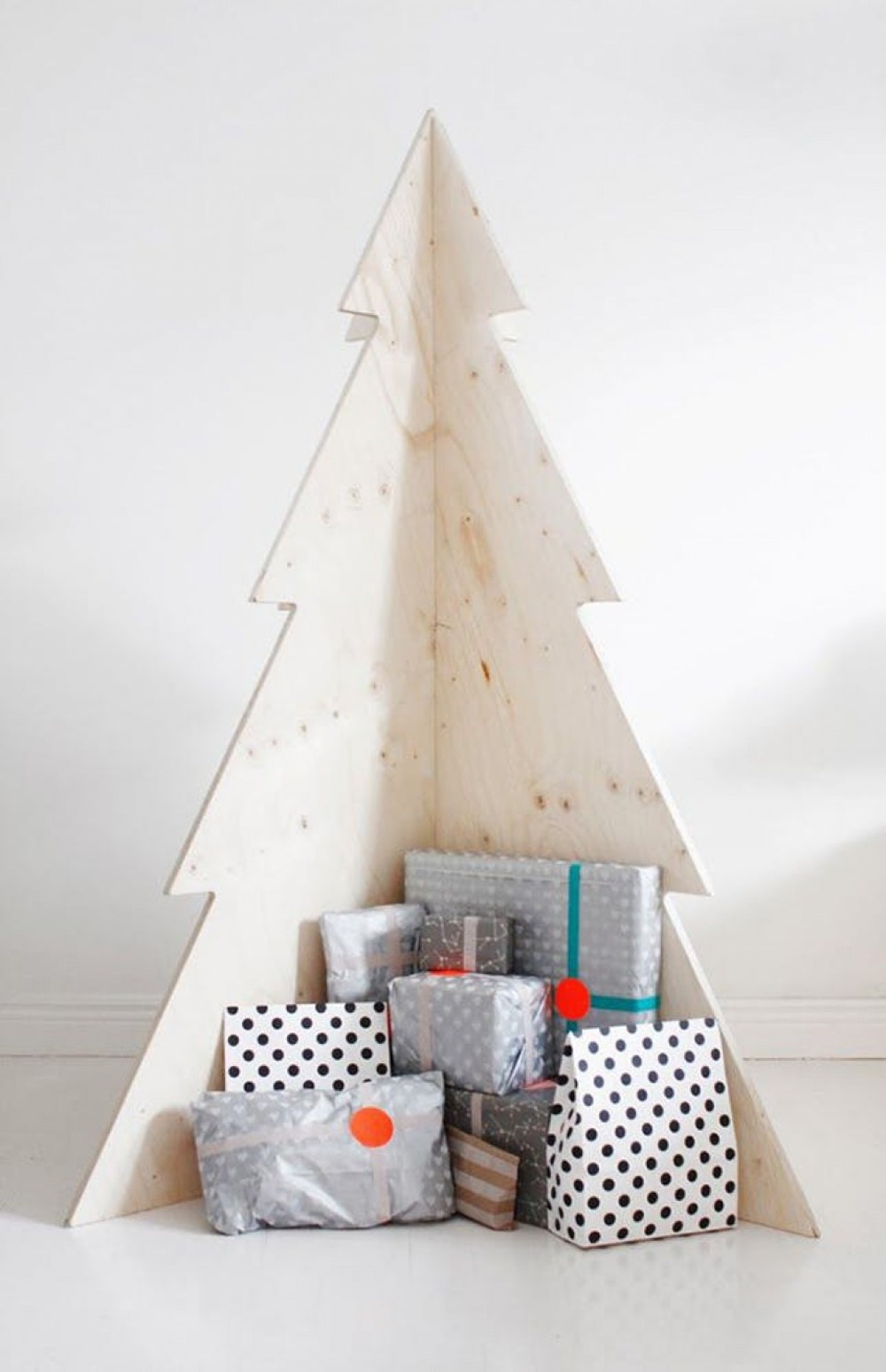 Large Plywood Christmas Tree Shape as Gift Nook — Minimalist Christmas Tree