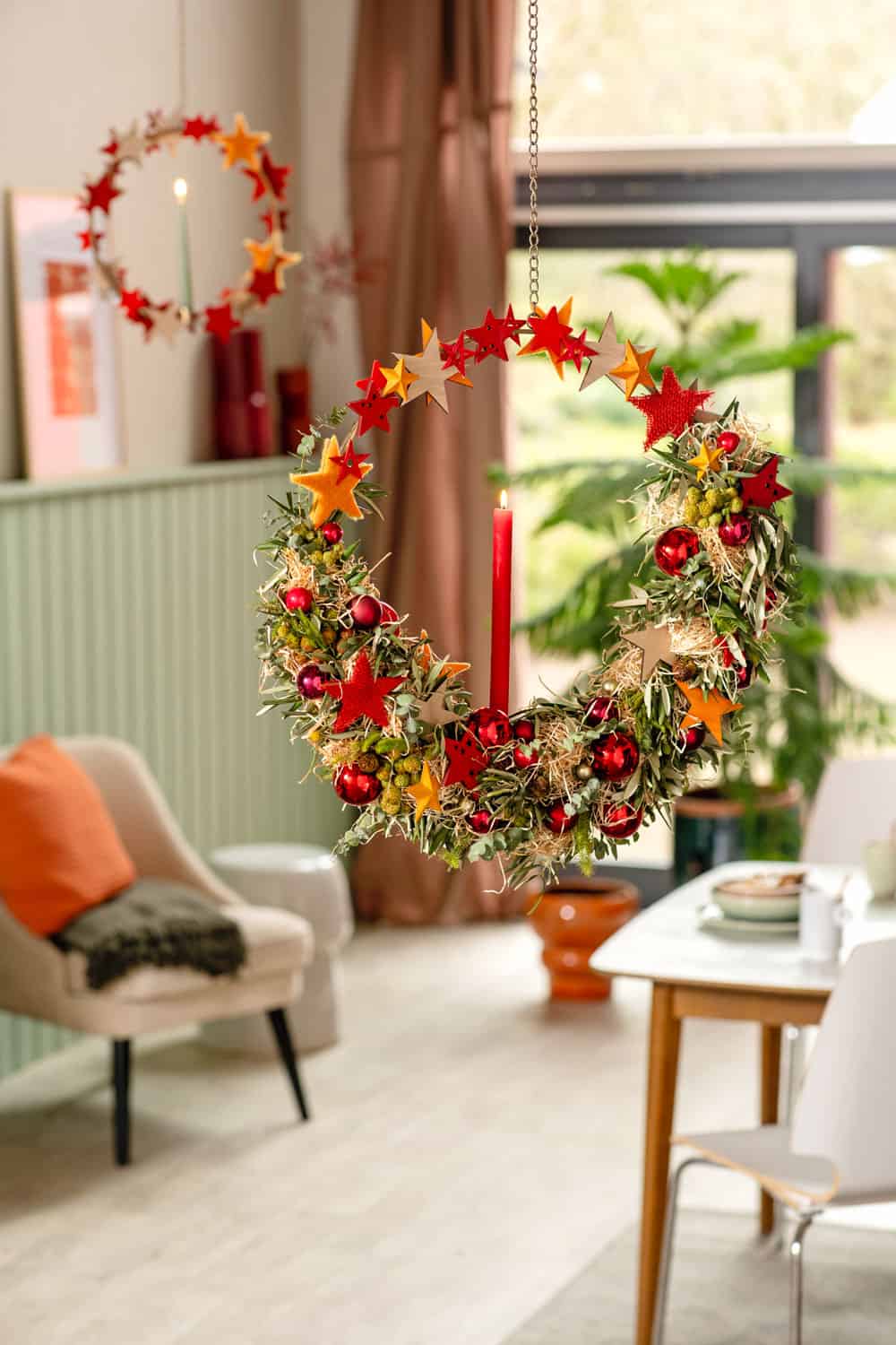 Bohemian Living Area with Large Hanging Christmas Wreaths — Christmas Living Room Decor