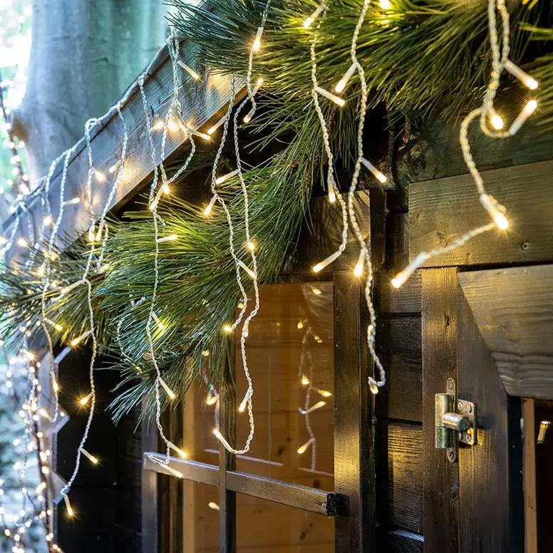 Cascading Icicle Lights on Wooden Structures — Outdoor Christmas Lights
