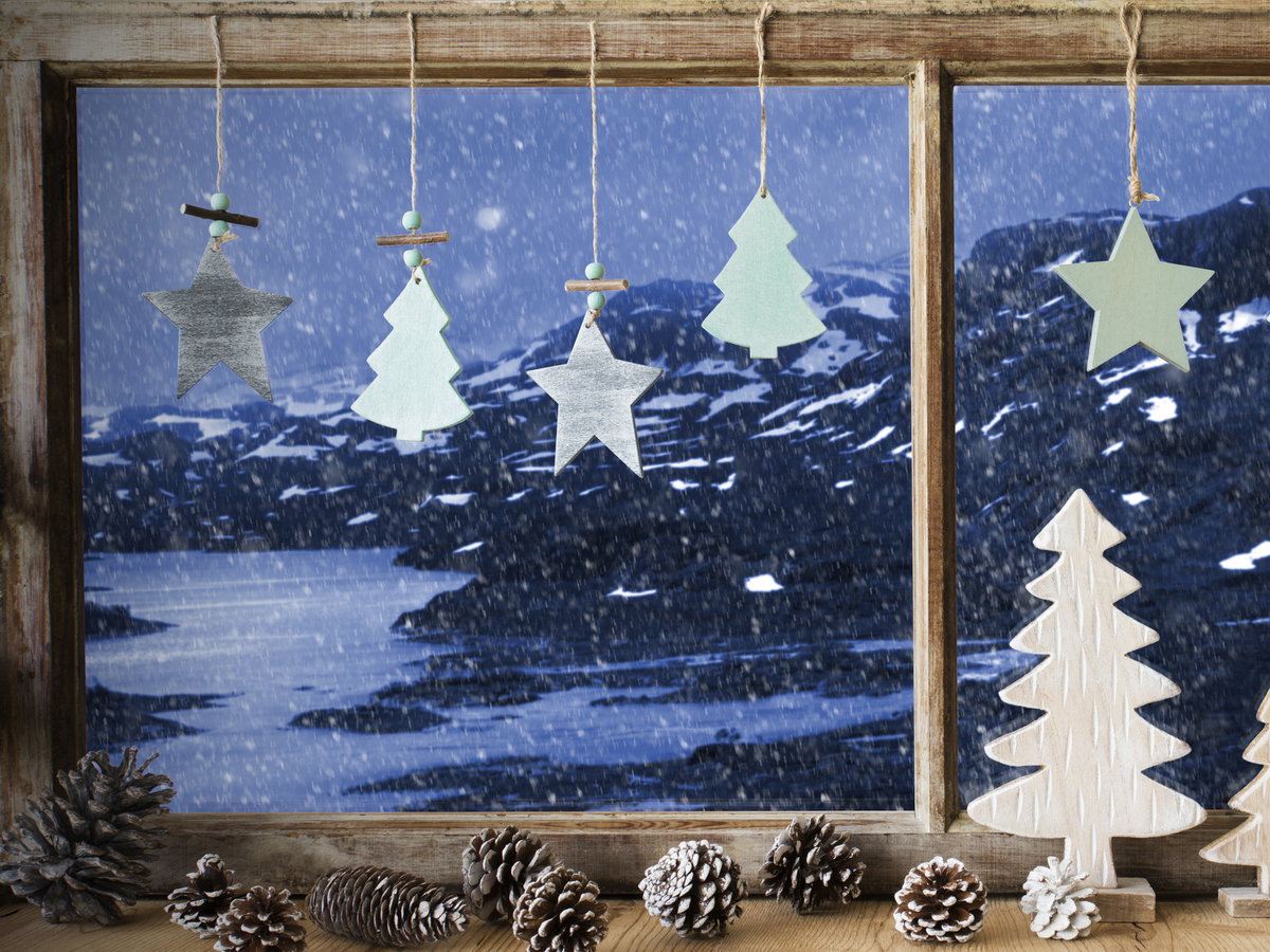Wooden Christmas Ornaments Adorn Snowy Window Wooden Christmas Ornaments Adorn Snowy Window — Christmas Window Decor Outdoor