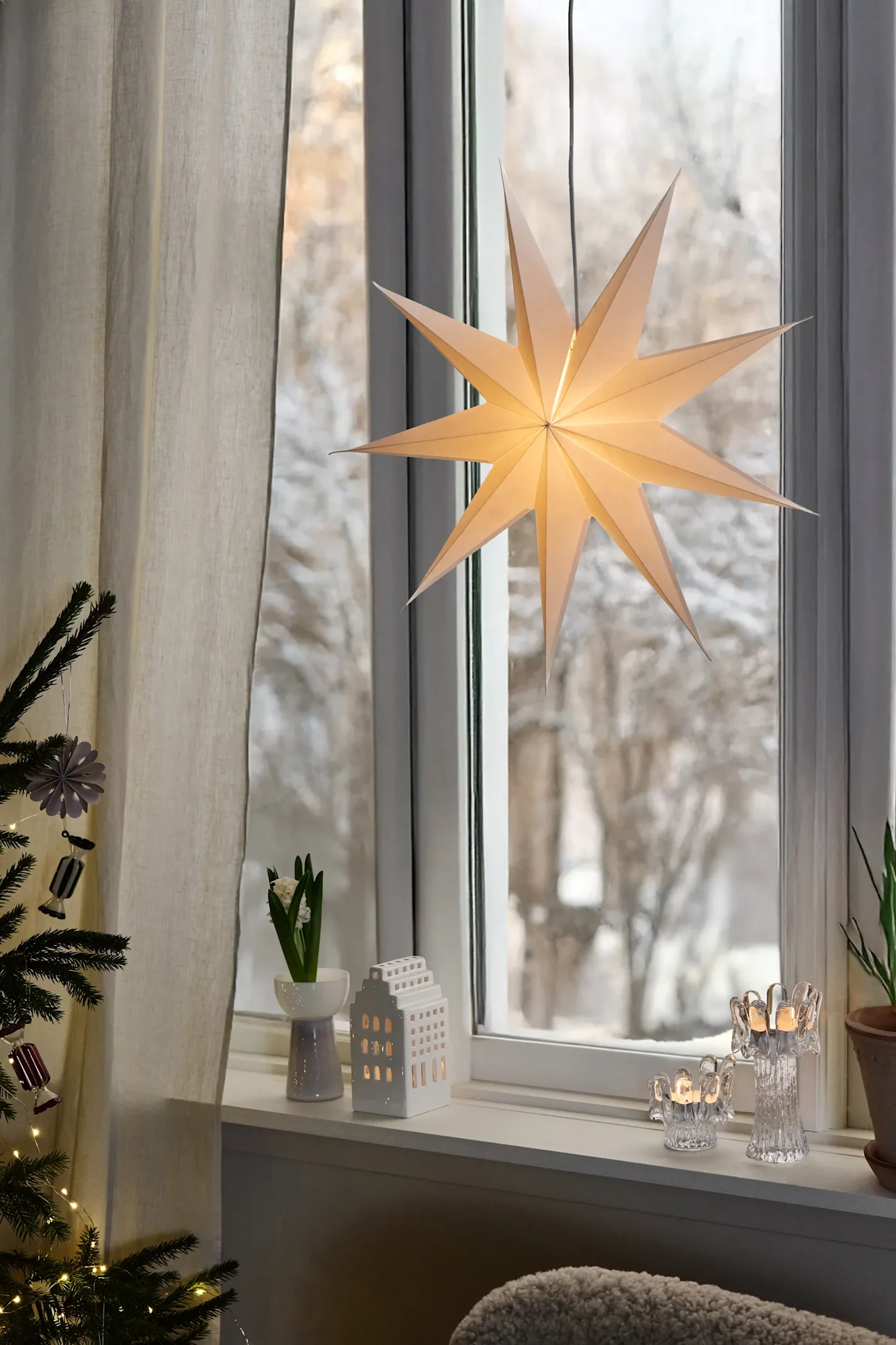 Cozy Window Sill with Glowing Paper Star Lantern — Traditional Christmas Decor