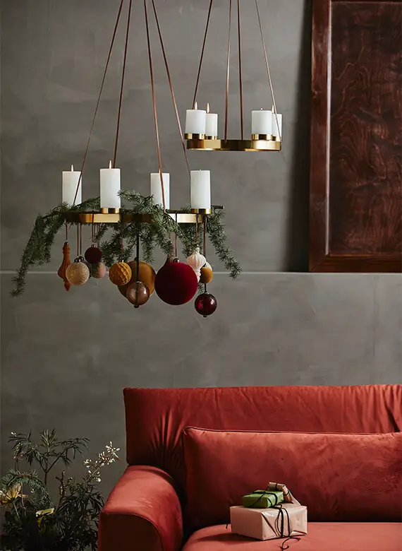 Elegant Living Room with a Gold Candle Chandelier and Red Velvet Sofa — Christmas Living Room Decor