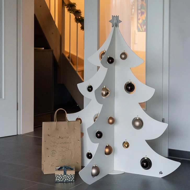 White Flat-Pack Christmas Tree with Gold and Brown Ornaments — Minimalist Christmas Tree