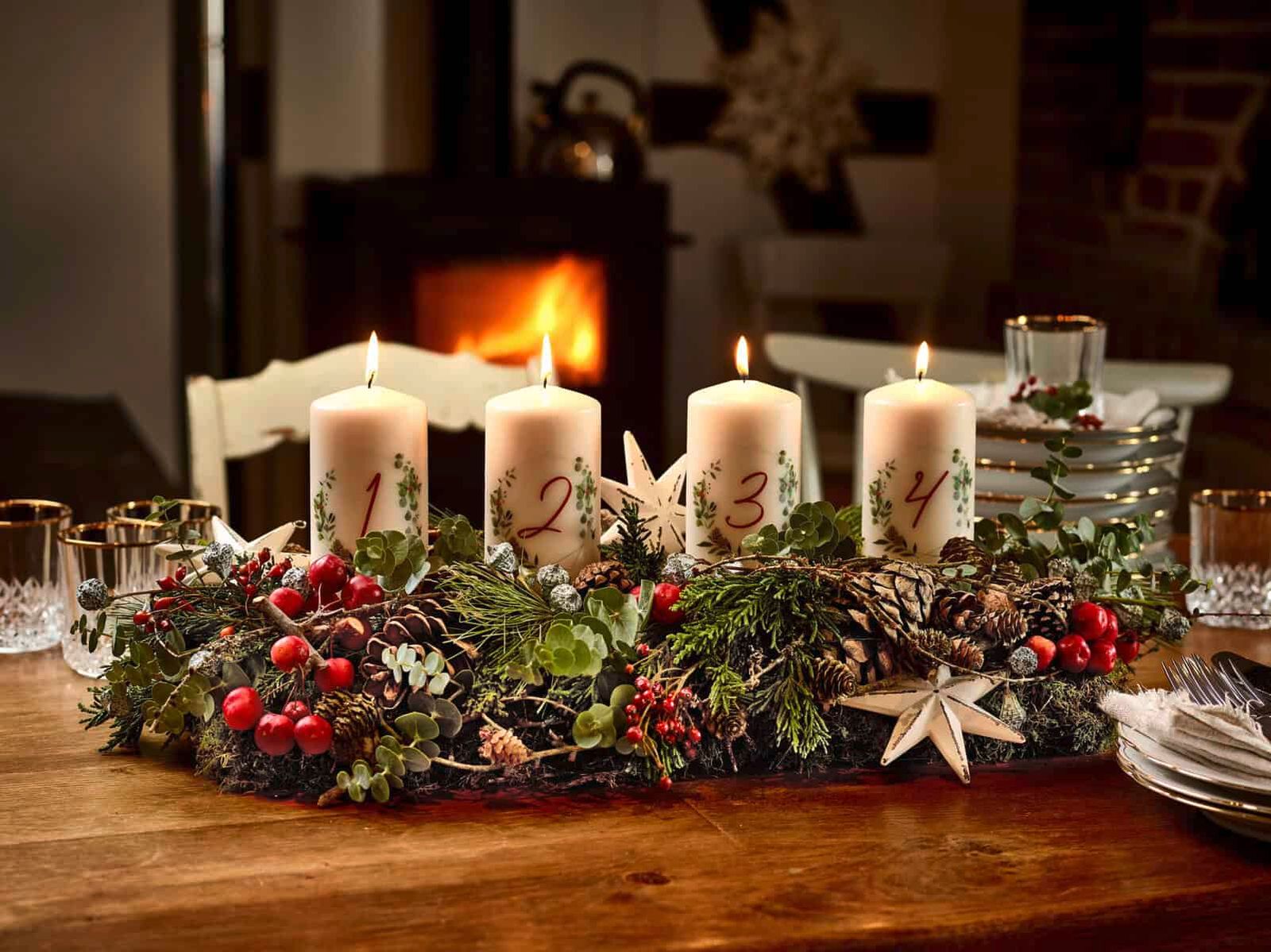 Authentic Advent Wreath with Four Pillar Candles on Wooden Table — Christmas Candle Decor