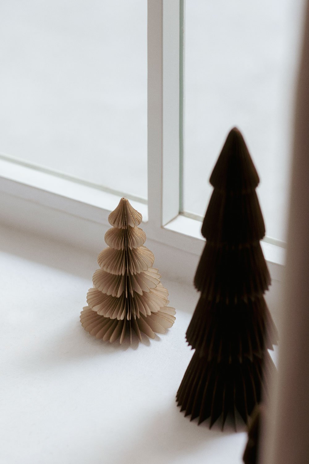 Minimalist Folded Paper Christmas Trees on Windowsill — Neutral Christmas Tree