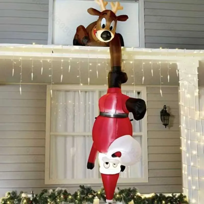 Inflatable Reindeer and Upside-Down Santa on Roof — Christmas Yard Decor