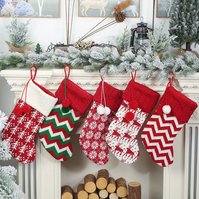 Festive Knit Stockings with Pom-Poms and Snowflakes — Christmas Stockings Display