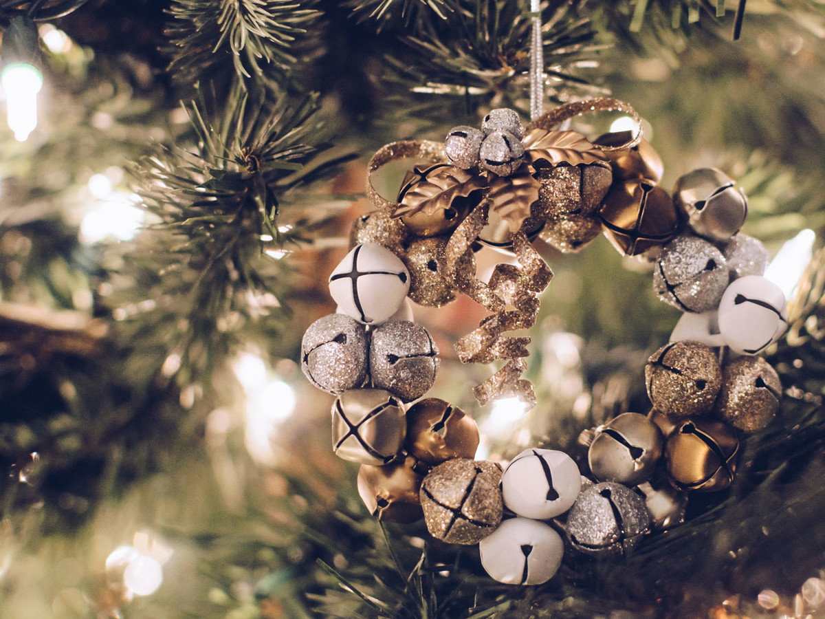 Intricate Wreath Ornament with Bells on a Glam Christmas Tree