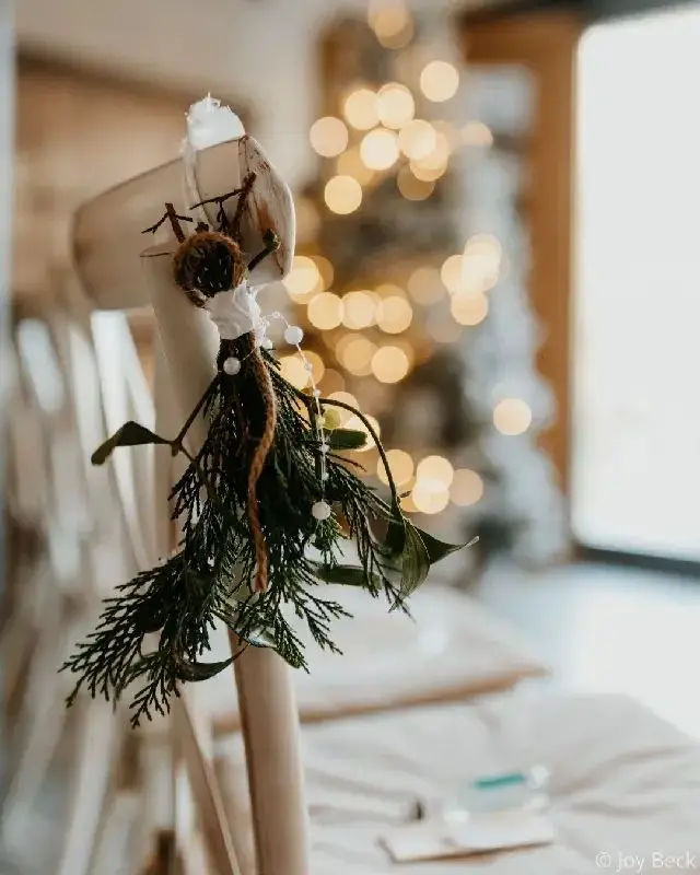 Winter Wedding Chair Decor: Evergreen Bundles and Beads — Christmas Wedding Decor