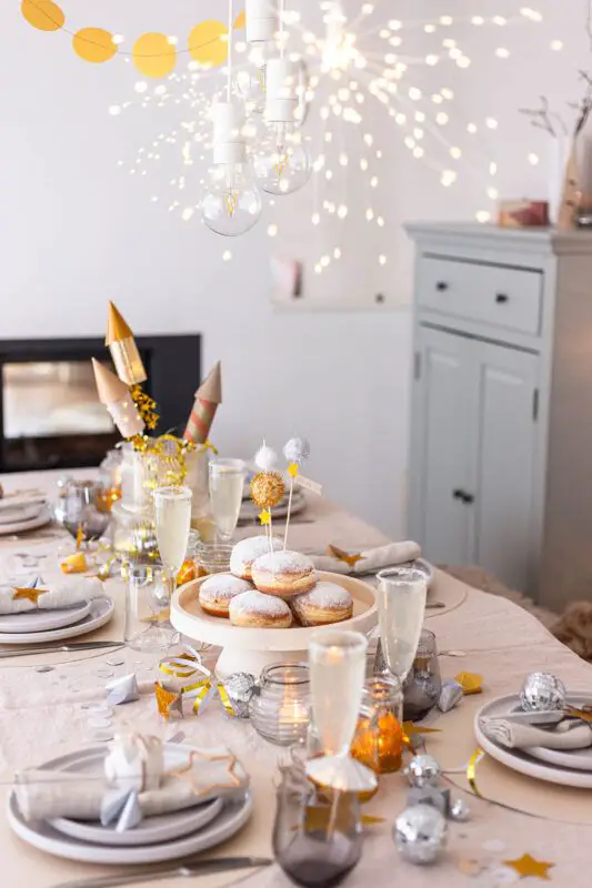 Playful Table Setting with Rocket Decorations and Confetti Playful Table Setting with Rocket Decorations and Confetti — New Years Eve Party Decor