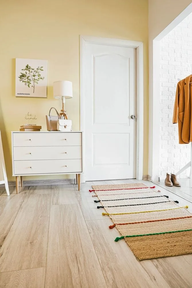 Linear Dresser Against Wall Rug On Floor Visual Idea — Christmas Entryway Decor