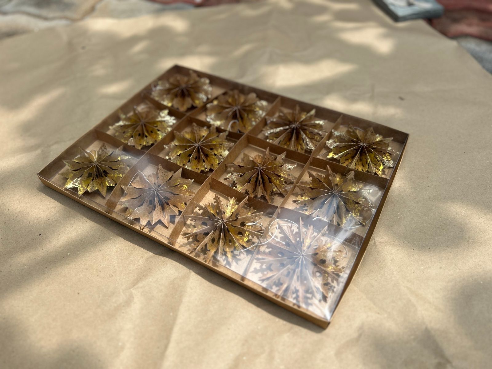 Box of Intricate Gold Paper Snowflakes