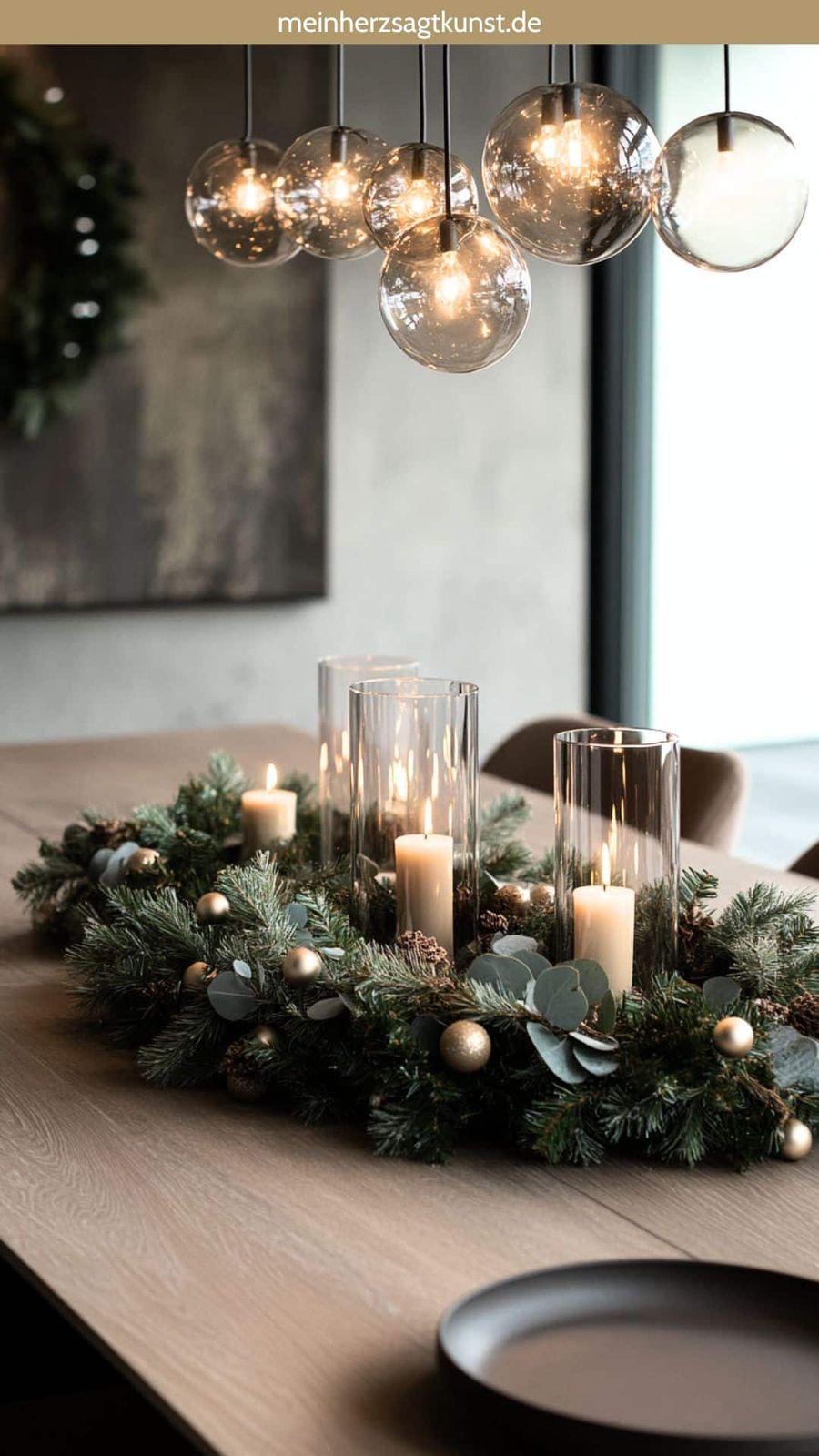 Modern Dining Table with Lush Green Garland and Gold Accents — Christmas Dining Room Decor