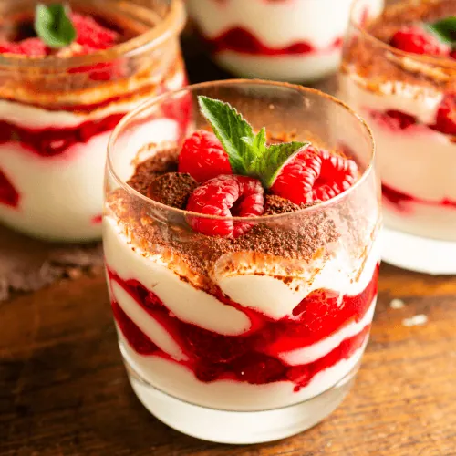 Layered Mascarpone Desserts with Raspberries and Mint — New Years Eve Dessert Table