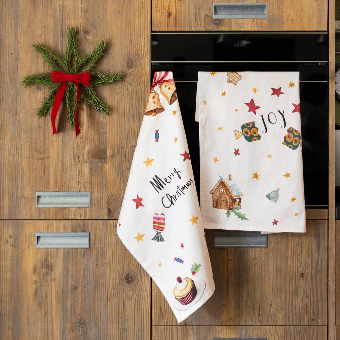 Festive Christmas Tea Towels Hanging on Cabinet Doors Festive Christmas Tea Towels Hanging on Cabinet Doors — Christmas Kitchen Decor