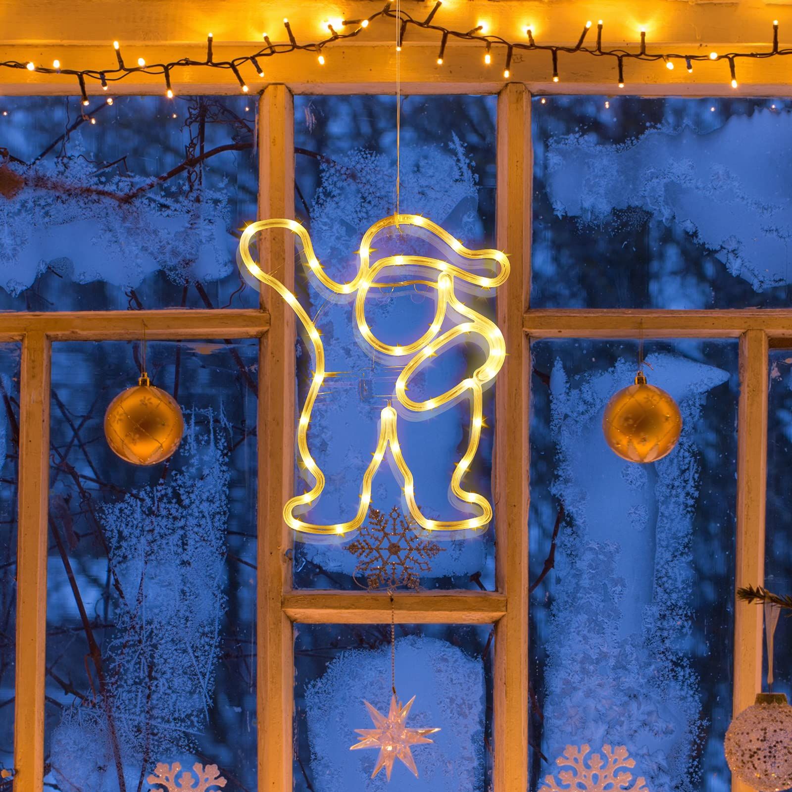 Illuminated Santa Figure in Festive Window — Christmas Fairy Lights Window