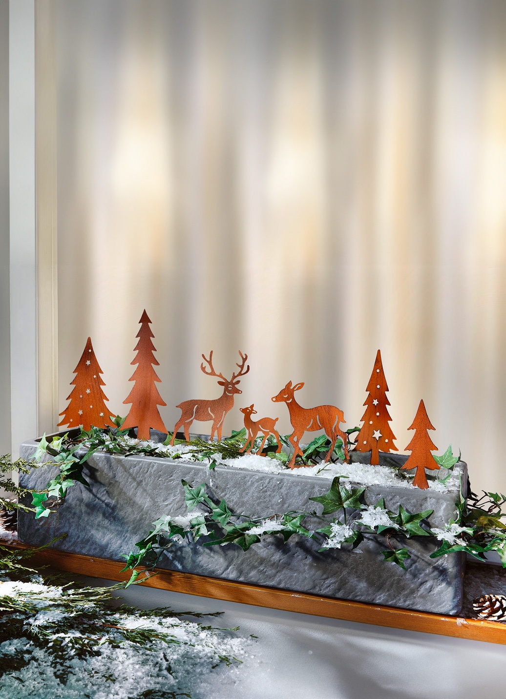 Figures Arranged In Planter Visual Idea — Christmas Entryway Decor
