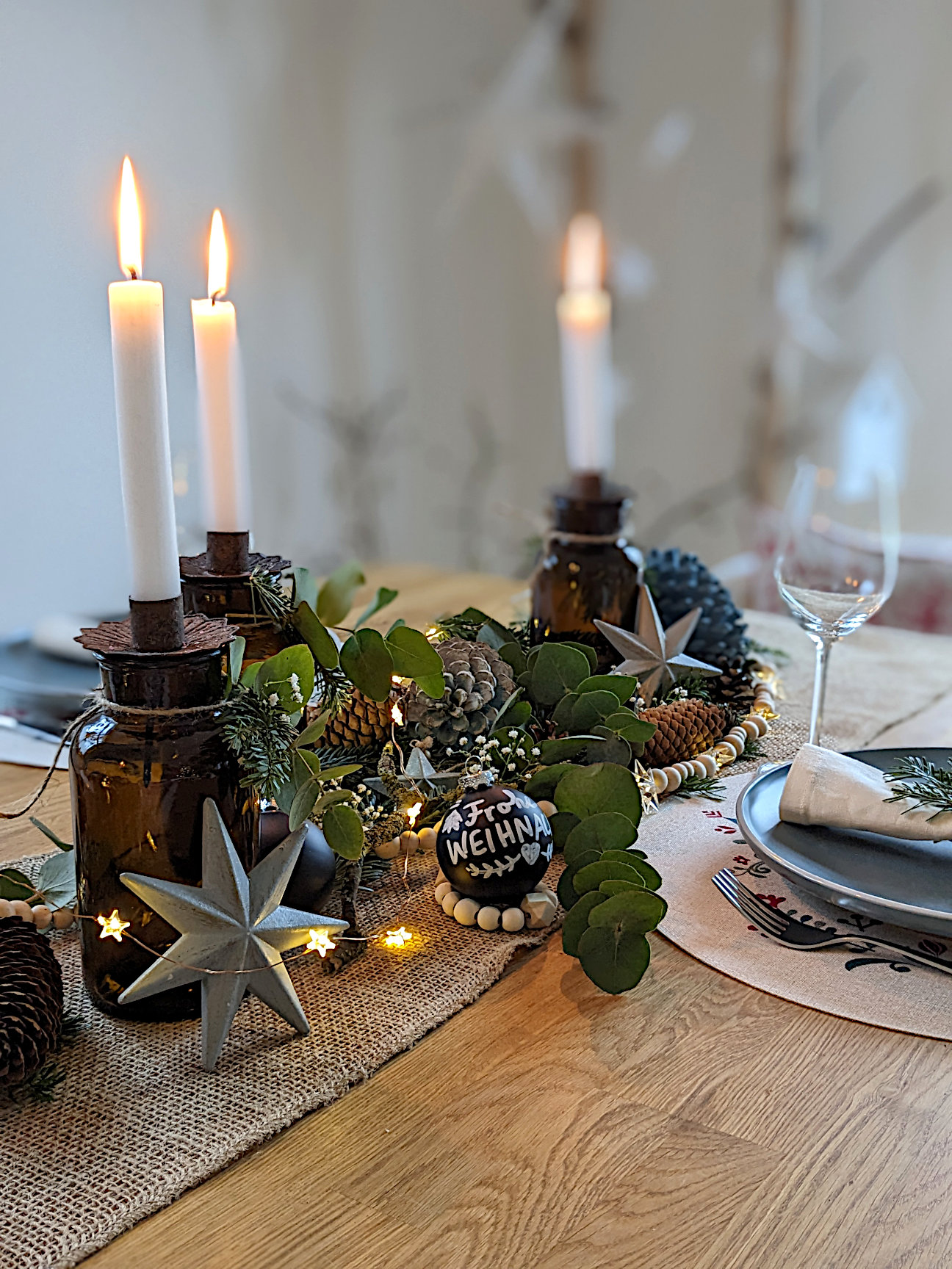 Rustic Table Runner with Amber Glass Jars and Eucalyptus Garland Rustic Table Runner with Amber Glass Jars and Eucalyptus Garland — Christmas Wedding Centerpiece