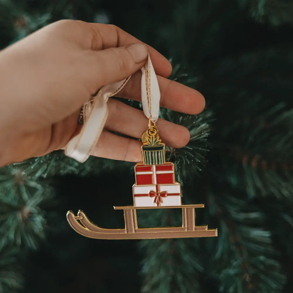 Traditional Sleigh Ornament with Gifts for Festive Flair Traditional Sleigh Ornament with Gifts for Festive Flair — Christmas Office Decor Ideas