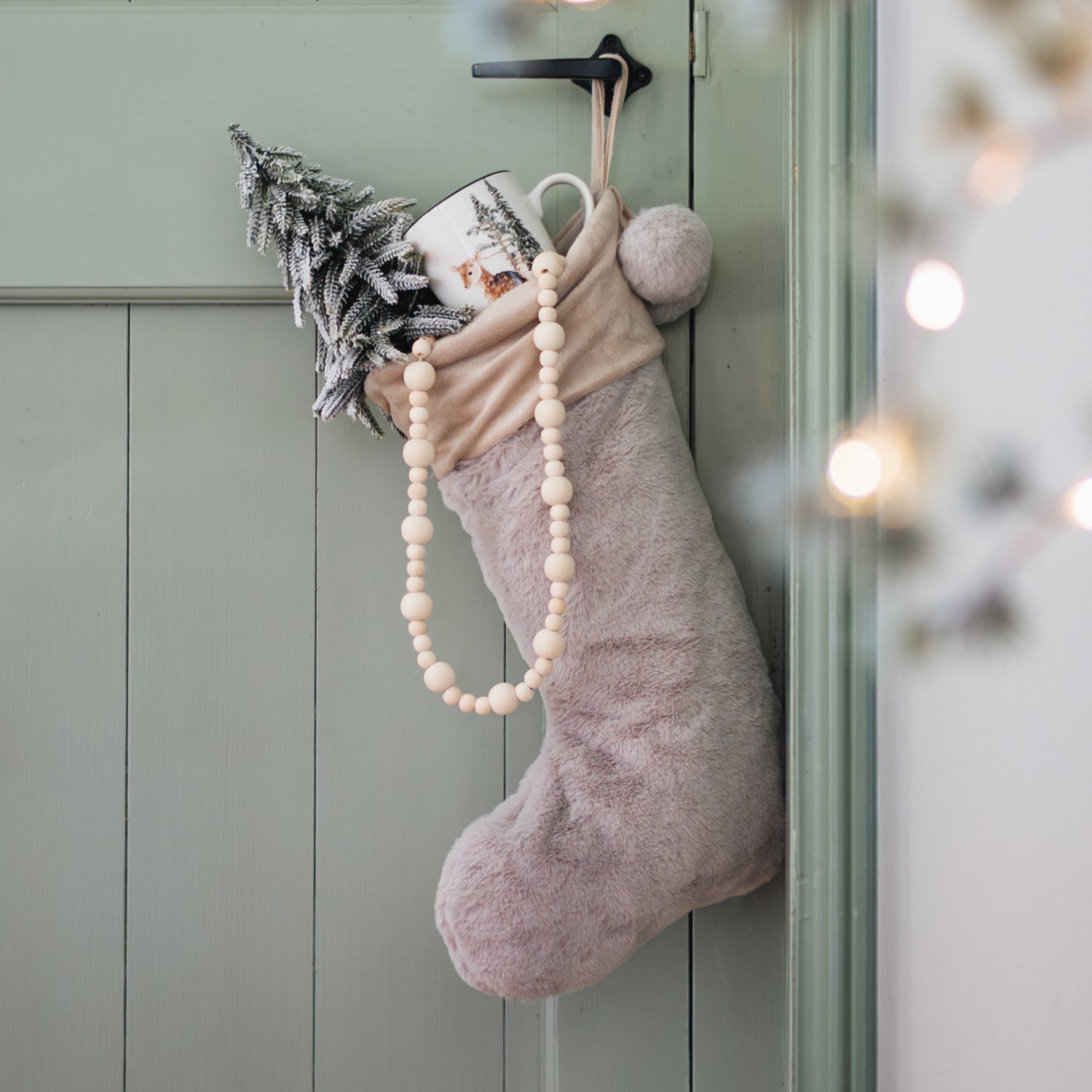 Plush Faux Fur Stocking with Miniature Tree — Christmas Stockings Display