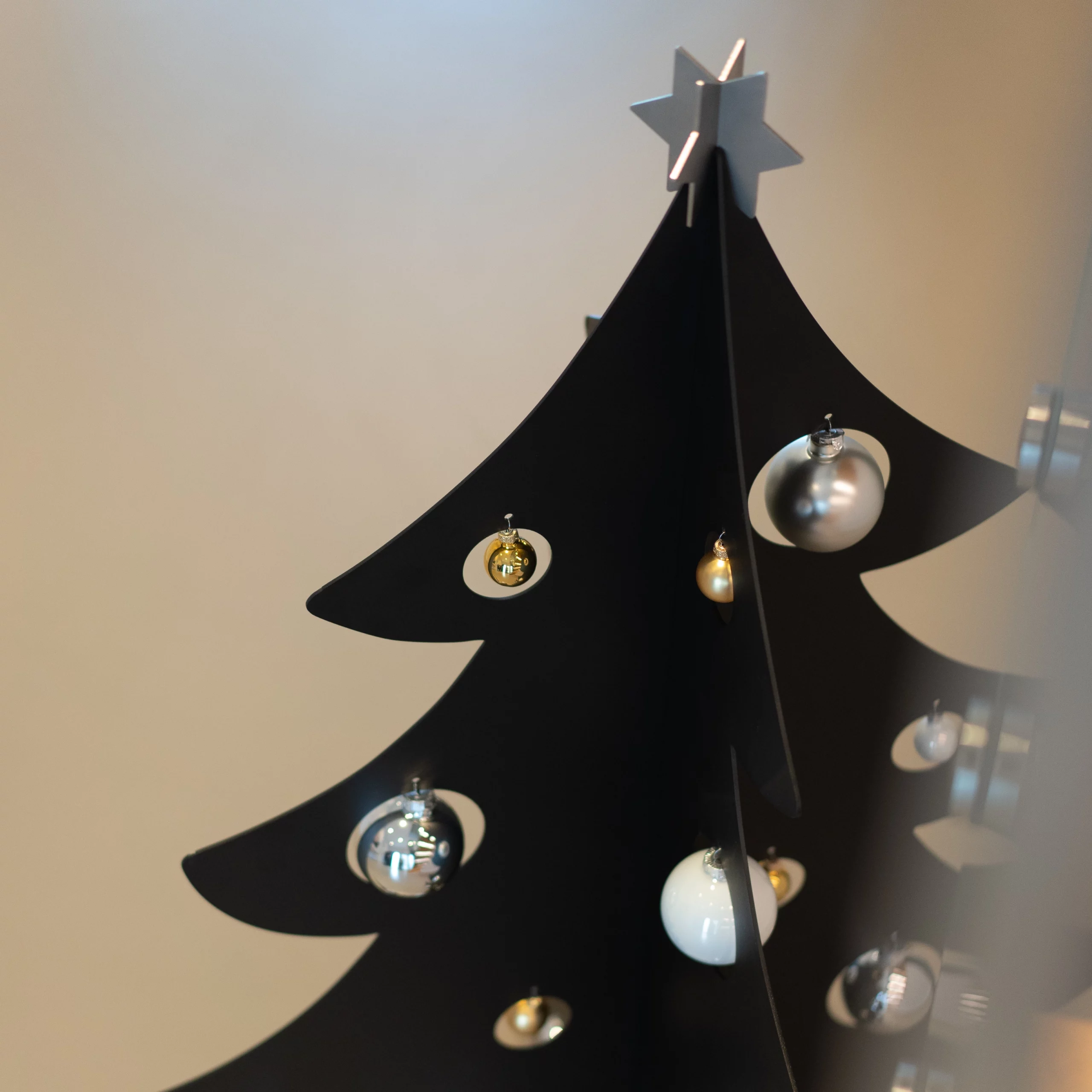 Stylized Black Metal Christmas Tree Silhouette — Minimalist Christmas Tree