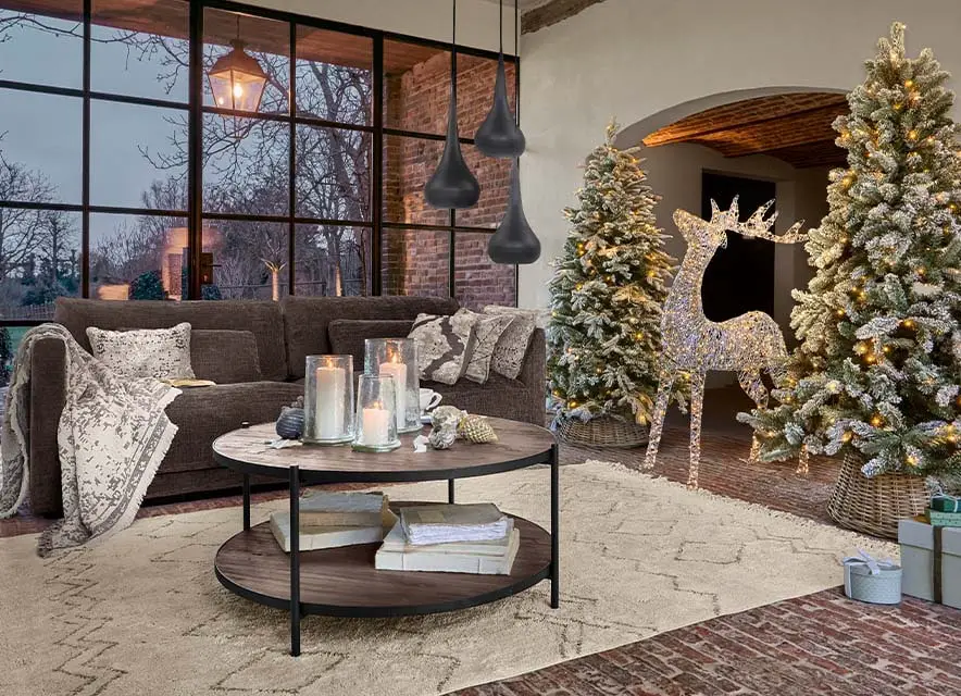 Two Lit Farmhouse Christmas Trees with a Reindeer Accent Two Lit Farmhouse Christmas Trees with a Reindeer Accent — Rustic Christmas Tree