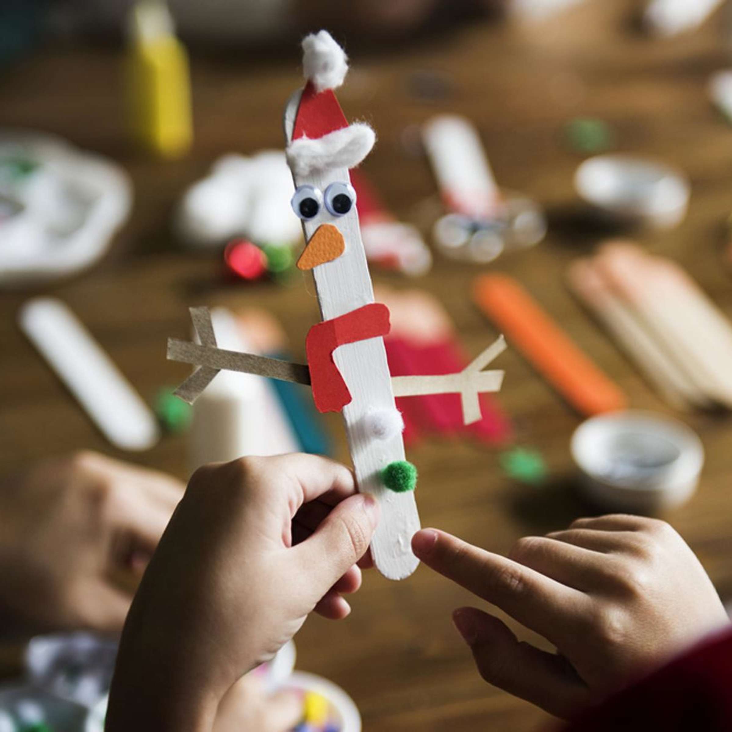 Popsicle Stick Snowman Craft Assembly — Christmas Crafts for Kids