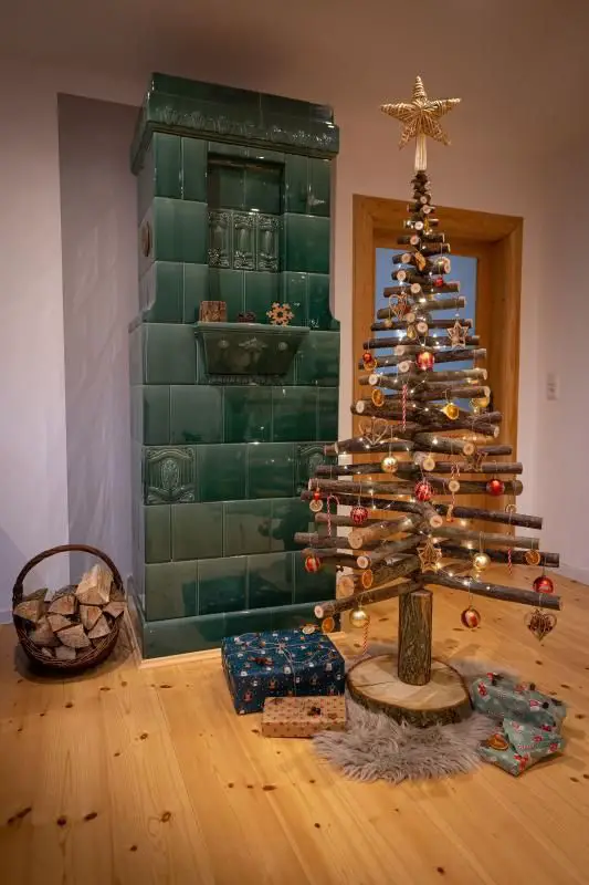 Rustic Christmas Tree of Stacked Wood Branches with Oranges — Christmas Tree Themes