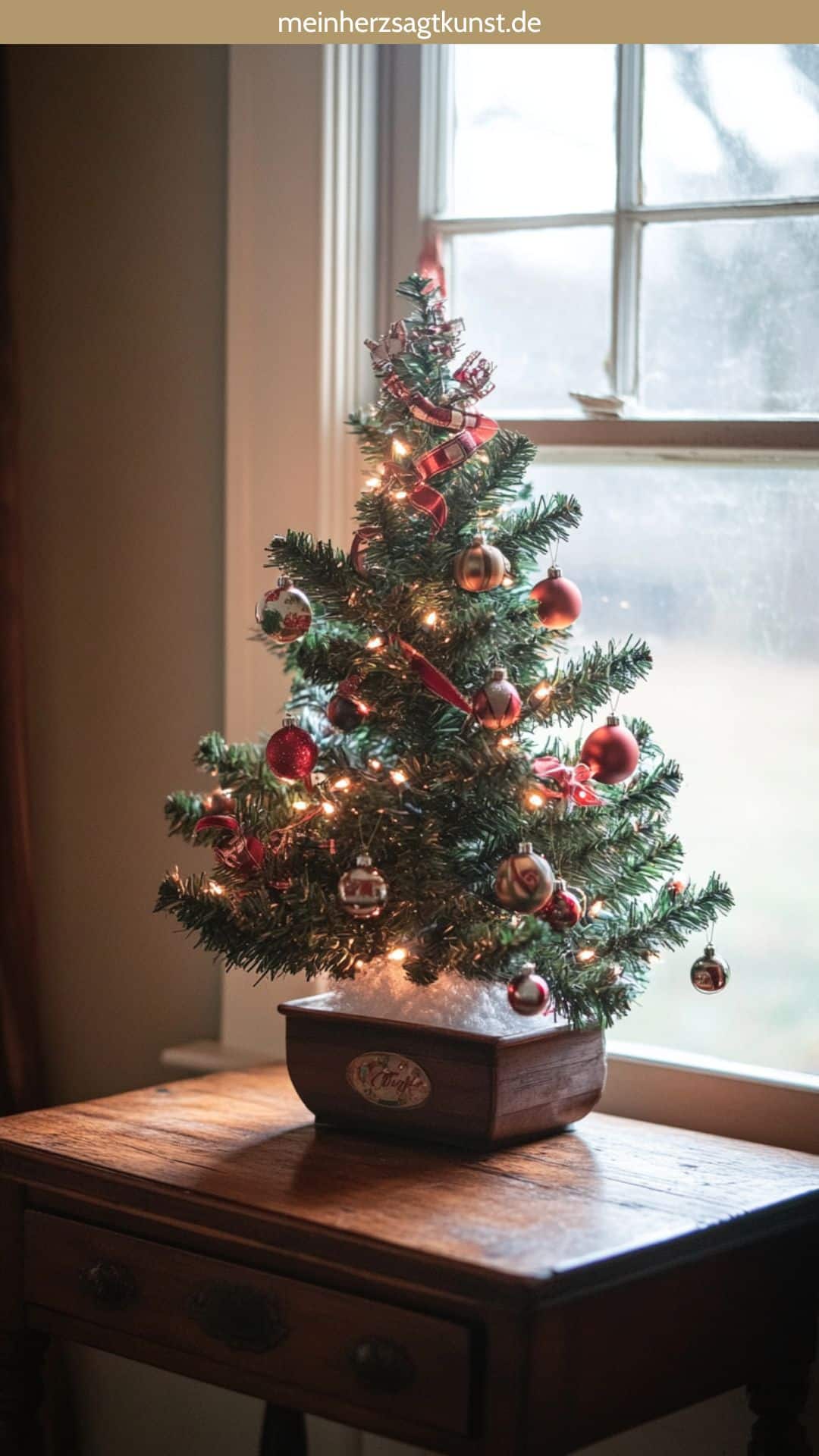 Miniature Christmas Tree with Red Ribbons and Fairy Lights Miniature Christmas Tree with Red Ribbons and Fairy Lights — Christmas Office Decor Ideas