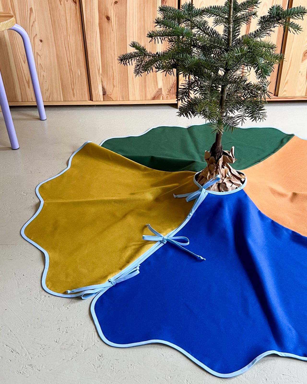 Vibrant Multi-Colored Fabric Skirt for a Bold Statement Vibrant Multi-Colored Fabric Skirt for a Bold Statement — Christmas Tree Skirt