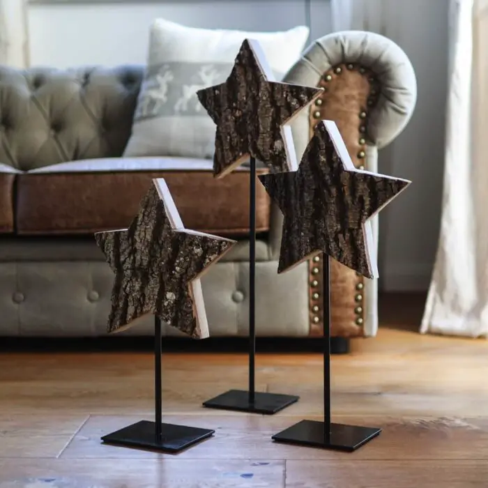 Rustic Wooden Star Decorations on the Floor — Christmas Living Room Decor