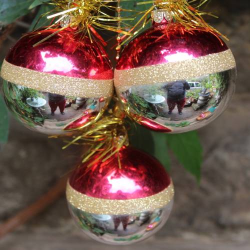 Red and Silver Ornaments Reflecting Surroundings Red and Silver Ornaments Reflecting Surroundings — Vintage Christmas Ornaments