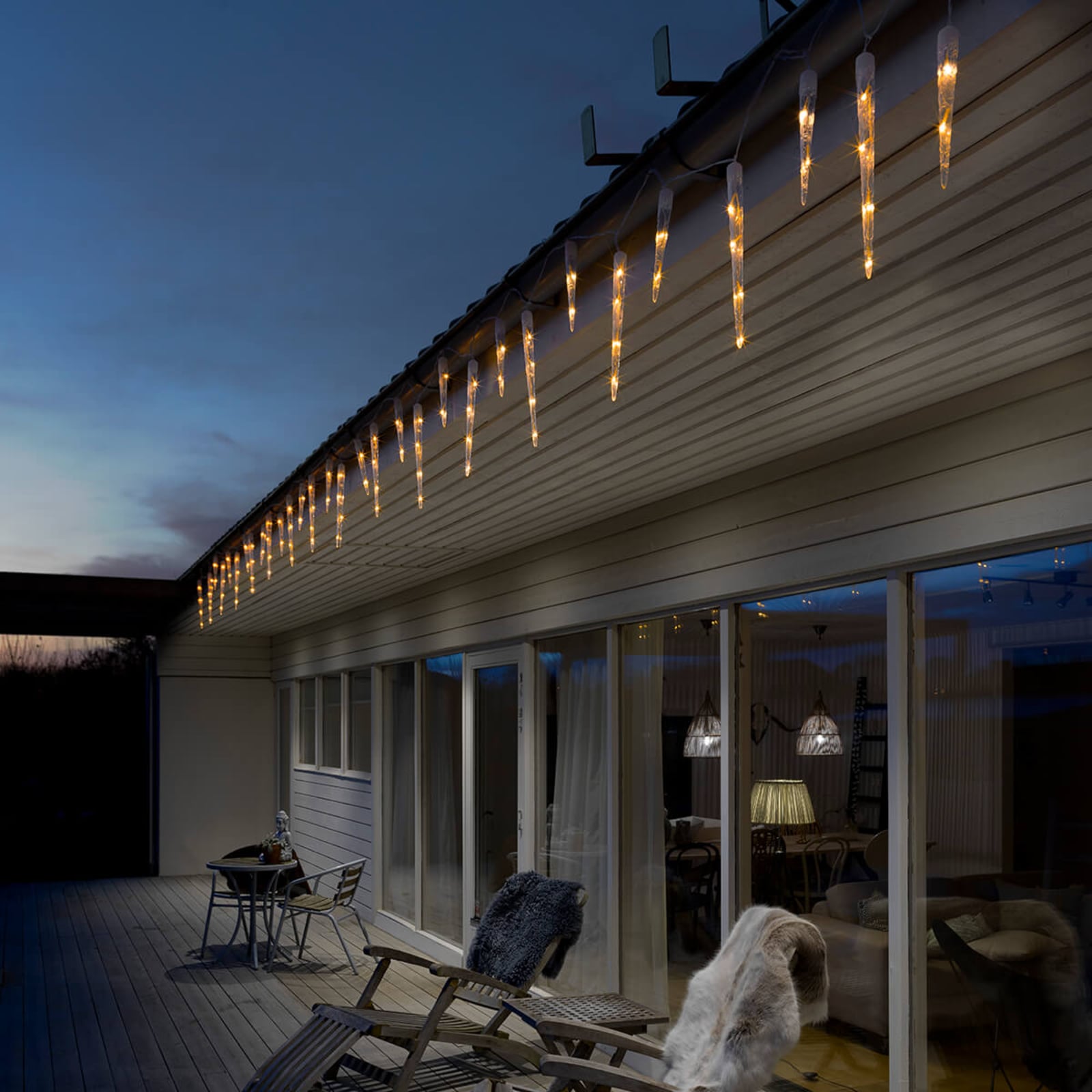 Cozy Patio Glow from Eaves Illumination Cozy Patio Glow from Eaves Illumination — Icicle Christmas Lights