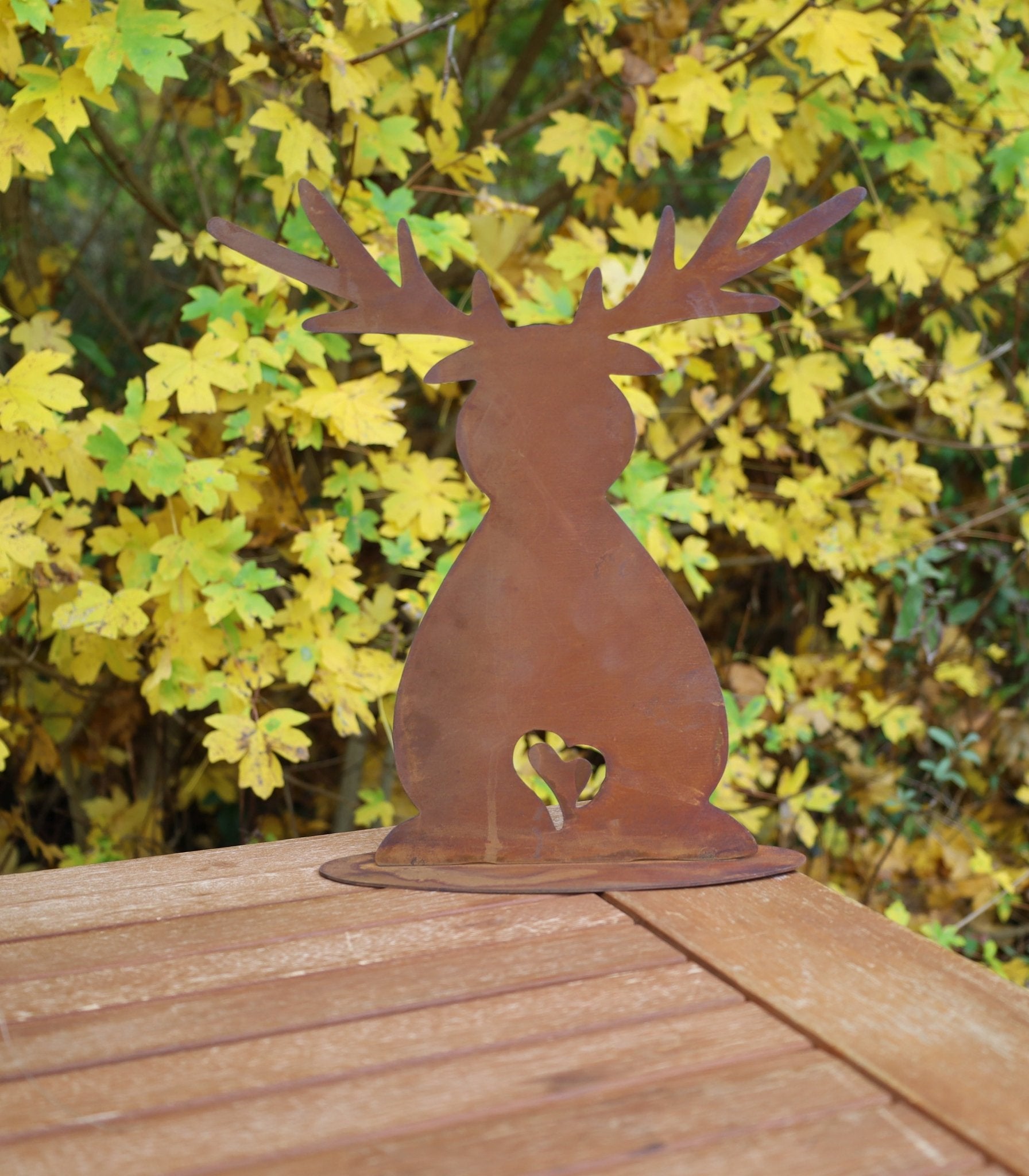 Rustic Metal Reindeer Silhouette on a Wooden Table — Christmas Yard Decor