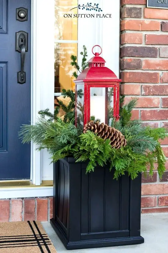 Place a Red Lantern in a Festive Planter Box — Christmas Porch Lanterns