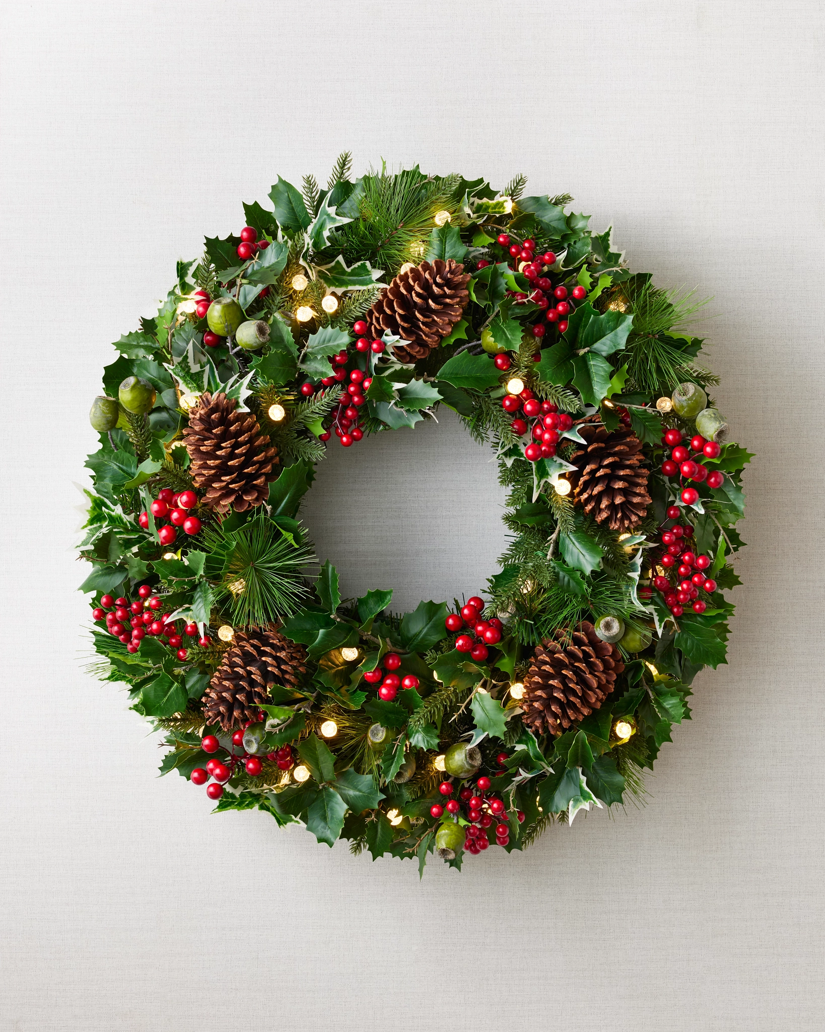 Evergreen Wreath with Holly, Pinecones, and Fairy Lights Evergreen Wreath with Holly, Pinecones, and Fairy Lights — Ornament Wreath