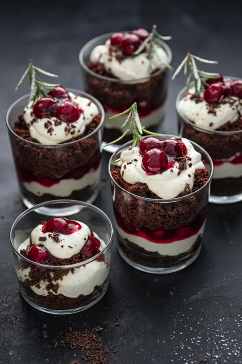 Deep Chocolate Trifles Layered with Cream and Cherries — New Years Eve Dessert Table